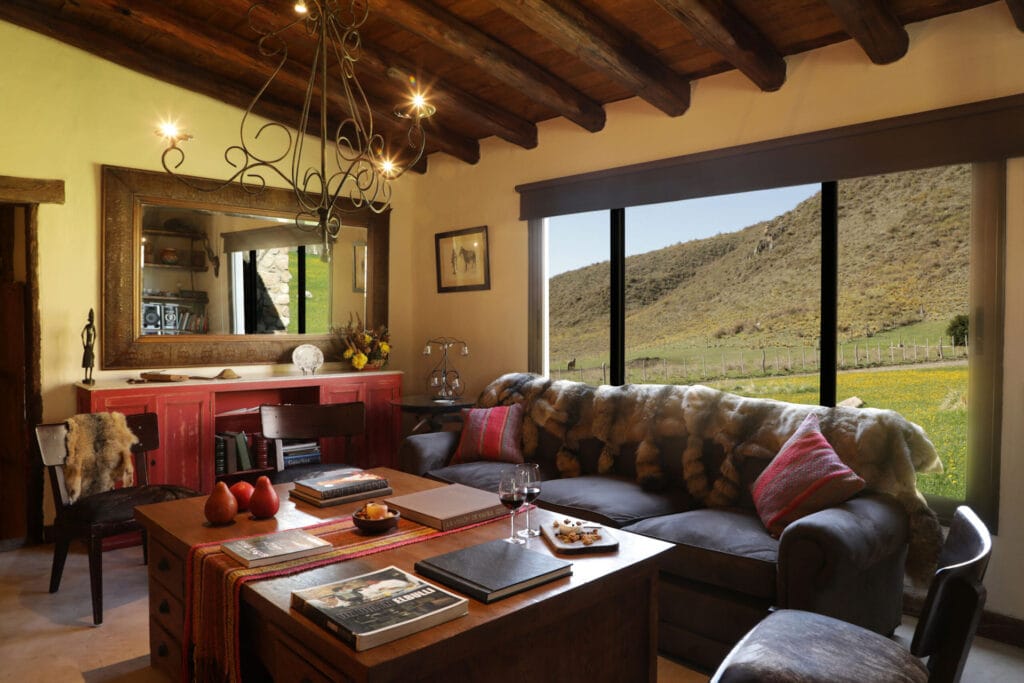 Red Stag Hunting Argentina a living room with a couch and a table